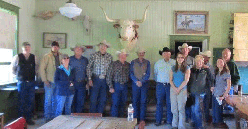 Tour participants pose for group photo at Lee Cornwell's ranch.